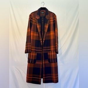 Express long trench coat. Front pockets. Navy and burnt orange plaid. Size L.